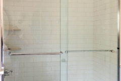 Custom glass shower with fixed glass panel