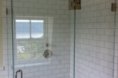 Angled frameless, glass shower doors