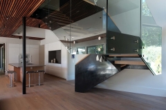 Custom glass interior staircase, exterior private residence in Darien