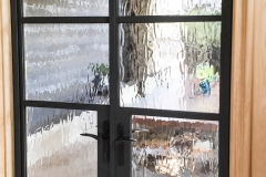 Custom panel doors with wave glass