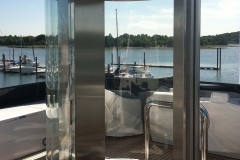 Glass elevator on private yacht, ADA compliant